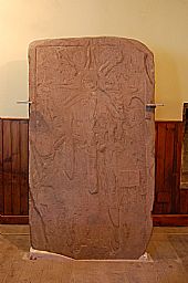 medieval gravestone on display, East Church, Cromarty